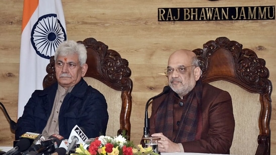 Union home minister Amit Shah addresses a joint press conference with Jammu and Kashmir Lieutenant Governor Manoj Sinha in Jammu on Friday. (ANI )