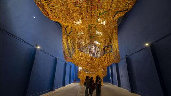 Another notable installation titled ‘Vitamin Sea’ by sculptor Parag Tandel –the only person of Koli lineage to be featured on MUAF’s bill of over 60 Indian and international artists – “dives deep into the myths of his community by revisiting underwater creatures” which are cast in a translucent, amber resin to “reflect the suffering of marine life and biology due to chemical pollutants from the city”. (Anshuman Poyrekar/HT PHOTO)