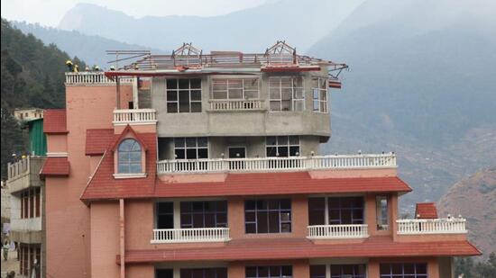The demolition of two badly damaged hotels in Joshimath was underway on Friday. (Rajeev Kala) The demolition of two badly damaged hotels in Joshimath was underway on Friday. (Rajeev Kala)
