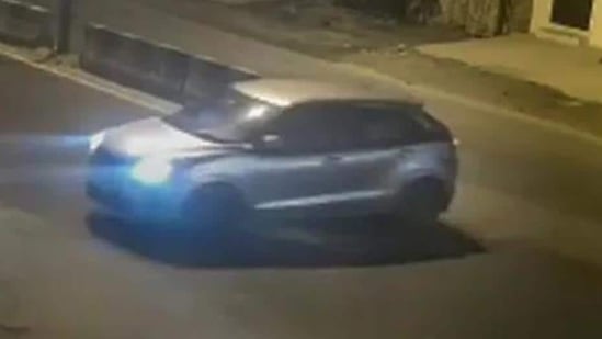 Video grab of a car that reportedly hit a woman and dragged her for kilometers, in the Sultanpuri area of Delhi. (PTI photo)