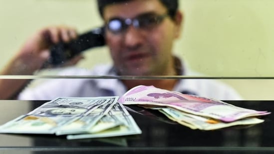 Currency seen at a forex bureau counter in New Delhi.(PTI Photo) Currency seen at a forex bureau counter in New Delhi.(PTI Photo)