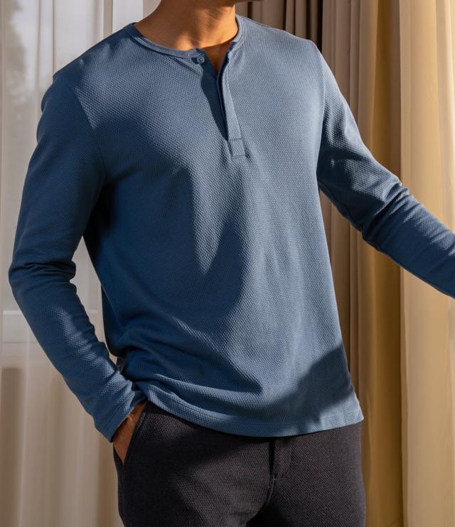 Stand out with this well-crafted, smart casual set of round neck full sleeve shirt and pants made in soft breathable fabrics in muted blue and grey. (Sustainably sourced cotton Popcorn collection by DaMensch) Stand out with this well-crafted, smart casual set of round neck full sleeve shirt and pants made in soft breathable fabrics in muted blue and grey. (Sustainably sourced cotton Popcorn collection by DaMensch)