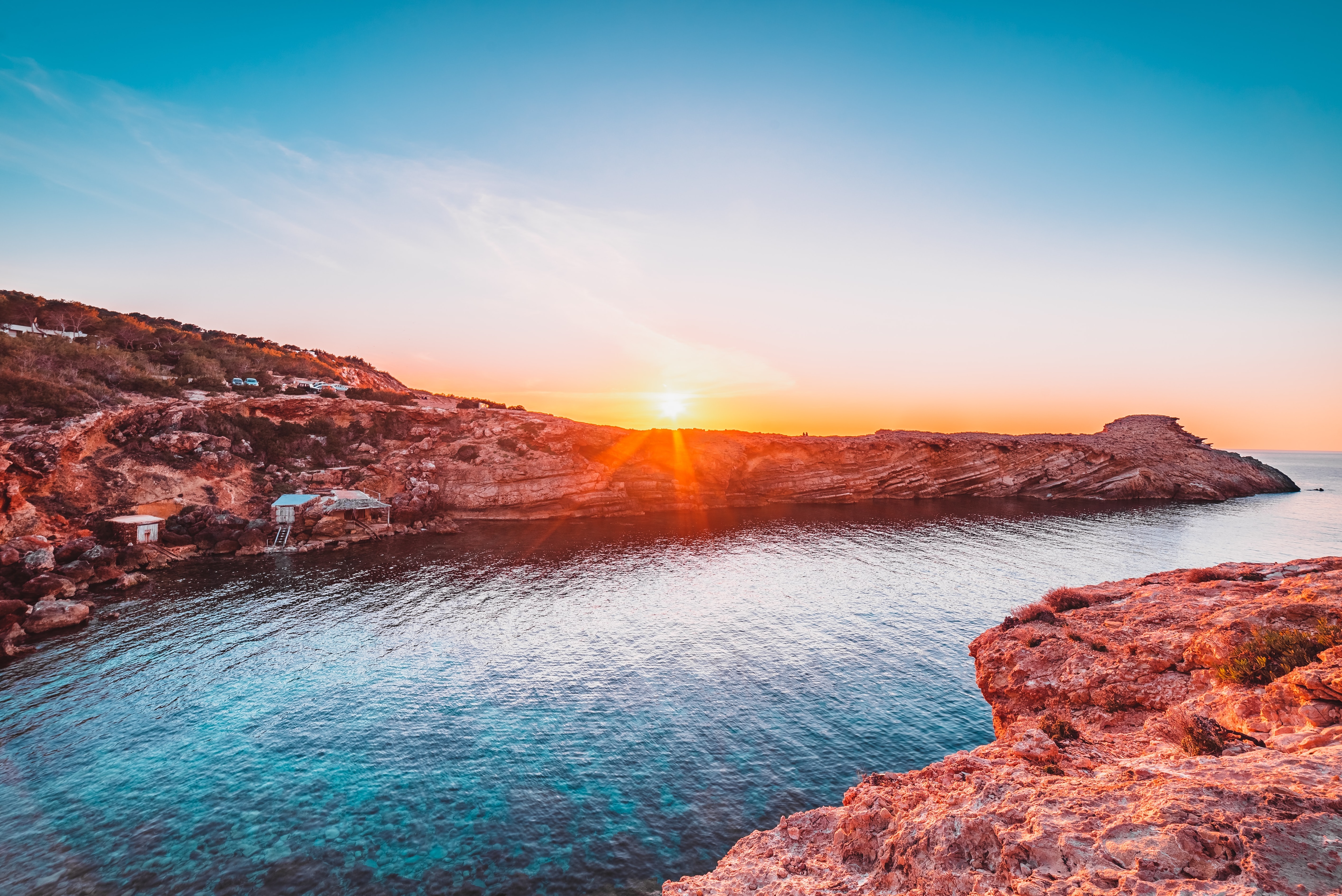 The beaches in Ibiza have wide areas for sunbathing and clear seas that call for a swim. (Unsplash)