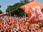 Indonesia: Laborers march towards the National Monument (Monas) complex. 