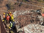 Malari Inn hotel being dismantled by SDRF personnel due to continuous land subsidence in Joshimath on Friday. (ANI) Malari Inn hotel being dismantled by SDRF personnel due to continuous land subsidence in Joshimath on Friday. (ANI)