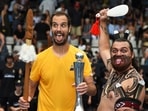 Richard Gasquet of France poses with the trophy with a local Maori perfomer (AP)