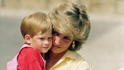 Princess Diana's Death: Diana, the Princess of Wales holds son Prince Harry. (AP File) Princess Diana's Death: Diana, the Princess of Wales holds son Prince Harry. (AP File)