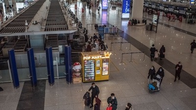 Covid In China: Travelers at Beijing Capital International Airport in Beijing, China. (Bloomberg) Covid In China: Travelers at Beijing Capital International Airport in Beijing, China. (Bloomberg)