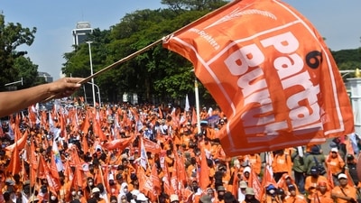 Indonesia: Laborers march towards the National Monument (Monas) complex. (Reuters)