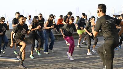 Mumbai, India - Jan. 14, 2023: Participant of Tata Mumbai Marathon, participating Full and Half marathon, getting prepared for upcoming marathon, at Marine Drives, in Mumbai, India, on Saturday, January 14, 2023. (Photo by Anshuman Poyrekar/ Hindustan Times) (Hindustan Times) Mumbai, India - Jan. 14, 2023: Participant of Tata Mumbai Marathon, participating Full and Half marathon, getting prepared for upcoming marathon, at Marine Drives, in Mumbai, India, on Saturday, January 14, 2023. (Photo by Anshuman Poyrekar/ Hindustan Times) (Hindustan Times)