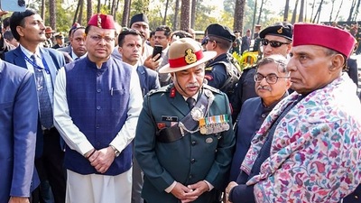 Dehradun: Defence Minister Rajnath Singh with Uttarakhand Chief Minister Pushkar Singh Dhami and others during a function on the occasion of Armed Forces Veterans Day, in Dehradun. (PTI) Dehradun: Defence Minister Rajnath Singh with Uttarakhand Chief Minister Pushkar Singh Dhami and others during a function on the occasion of Armed Forces Veterans Day, in Dehradun. (PTI)