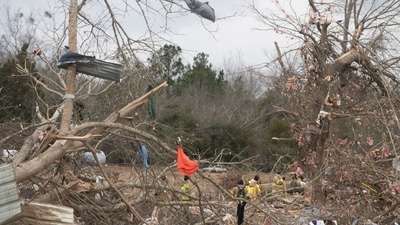 Alabama Tornado: Search and rescue crews investigate following tornado on Sandy Ridge Road in Old Kingston, Alabama. (AP) Alabama Tornado: Search and rescue crews investigate following tornado on Sandy Ridge Road in Old Kingston, Alabama. (AP)