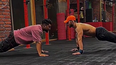 The image shows the man looking at his trainer. (Screengrab)