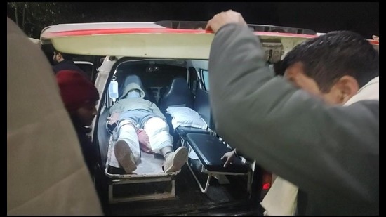 The accused, Yuvraj Singh, being taken to GMCH, Sector 32, Chandigarh, after the encounter at a Zirakpur hotel on Saturday evening. (HT Photo) The accused, Yuvraj Singh, being taken to GMCH, Sector 32, Chandigarh, after the encounter at a Zirakpur hotel on Saturday evening. (HT Photo)