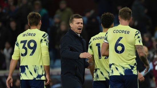 Leeds United's head coach Jesse Marsch, talks to some of his players as they walk from the pitch after the end of the English Premier League soccer match between Aston Villa and Leeds United at Villa Park in Birmingham, England, Friday, Jan. 13, 2023. Villa won the match 2-1. (AP Photo/Rui Vieira)(AP)
