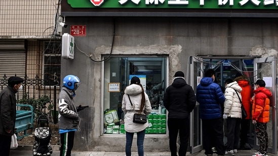 Covid In China: People queueing to buy medicine amid the Covid-19 pandemic in Beijing, (AFP)