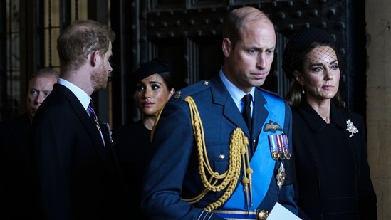 Prince Harry-Meghan Markle: Britain's Prince William, Kate, Princess of Wales, Prince Harry and Meghan, Duchess of Sussex, second left, leave after they paid their respects to Queen Elizabeth II.(AP) Prince Harry-Meghan Markle: Britain's Prince William, Kate, Princess of Wales, Prince Harry and Meghan, Duchess of Sussex, second left, leave after they paid their respects to Queen Elizabeth II.(AP)