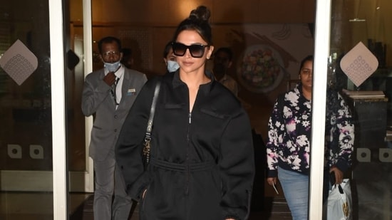 Deepika Padukone walked out of the Mumbai airport late Friday in a black track suit and her hair tied in a rough bun. She is gearing up for the release of her upcoming film Pathaan, opposite Shah Rukh Khan. (Varinder Chawla)