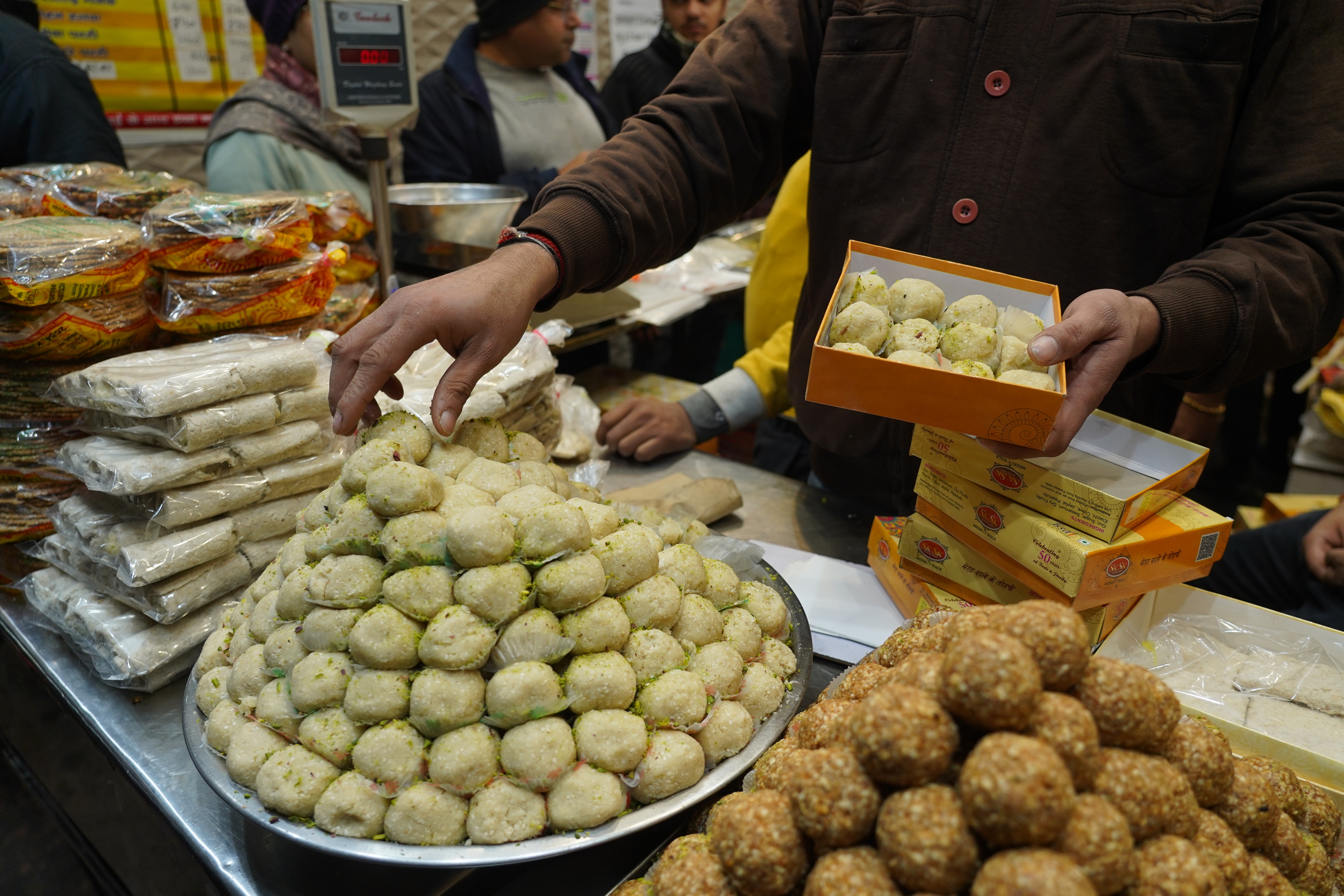 Old favourites like gajjaks and laddoos can be tried alongside Khoya malai gajjak and Khajur dry fruit bars. Old favourites like gajjaks and laddoos can be tried alongside Khoya malai gajjak and Khajur dry fruit bars.