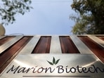 Logo of Marion Biotech, a healthcare and pharmaceutical company, seen on gate outside office in Noida. (REUTERS/Anushree Fadnavis)