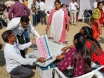 The Election Commission made the proposal in a letter to several political parties on December 28, asking them to attend a demonstration of the prototype RVM on January 16, and forward their comments by January 31, 2023. (PTI) The Election Commission made the proposal in a letter to several political parties on December 28, asking them to attend a demonstration of the prototype RVM on January 16, and forward their comments by January 31, 2023. (PTI)