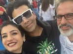 Raveena Tandon with her family and Karan Johar at a school event. Raveena Tandon with her family and Karan Johar at a school event.