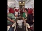 Toddler shaking hands with passengers he meets aboard a flight. (Twitter/@MorissaSchwartz) Toddler shaking hands with passengers he meets aboard a flight. (Twitter/@MorissaSchwartz)