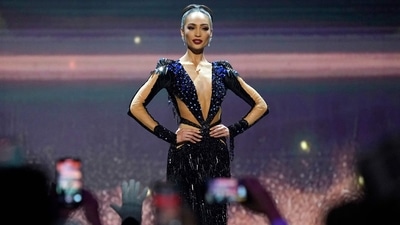 R'Bonney's gown features a deep waist-length neckline, heavy embellishments on the shoulder pads, and a figure-hugging silhouette. She styled it with shimmering diamond earrings and a sleek updo. (AFP) R'Bonney's gown features a deep waist-length neckline, heavy embellishments on the shoulder pads, and a figure-hugging silhouette. She styled it with shimmering diamond earrings and a sleek updo. (AFP)