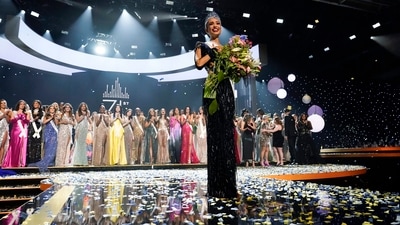 The 71st Miss Universe walks the stage after being crowned the winner by Harnaaz Sandhu. She wore a sparkling cut-out gown decorated in tassels and sequin work for the final round. (AP) The 71st Miss Universe walks the stage after being crowned the winner by Harnaaz Sandhu. She wore a sparkling cut-out gown decorated in tassels and sequin work for the final round. (AP)