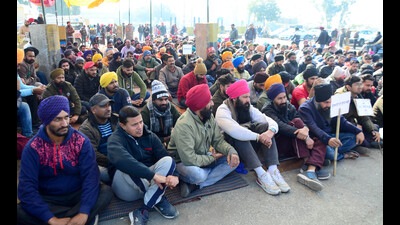 Members of the 108 Ambulance Employees’ Association protesting for the fifth straight day at Ladhowal toll plaza in Ludhiana on Sunday. (Harvinder Singh/HT)