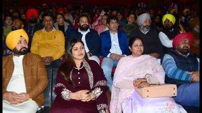Punjab minister Anmol Gagan Maan (centre) attending a function at Ishmeet Singh Music Institute in Ludhiana on Sunday. (HT Photo)