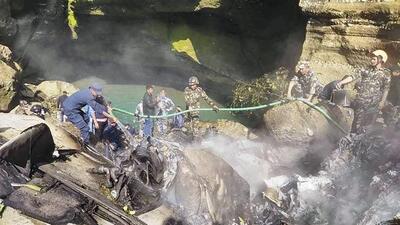 Rescue operation is underway after a passenger plane of Yeti Airlines' crashed while landing at the Pokhara airport in Nepal. (PTI) Rescue operation is underway after a passenger plane of Yeti Airlines' crashed while landing at the Pokhara airport in Nepal. (PTI)
