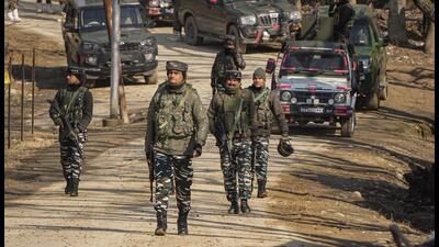 Security personnel in Budgam district of Jammu and Kashmir on Sunday. (PTI)
