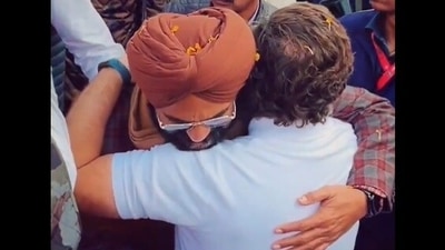Singer Sidhu Moose Wala's father Balkaur Singh with Rahul Gandhi. (Source: Congress/Twitter)