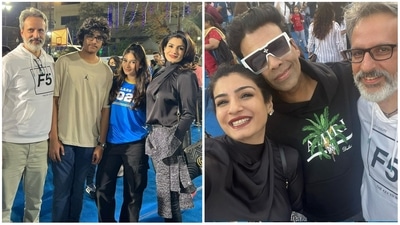 Raveena Tandon with her family and Karan Johar at a school event. Raveena Tandon with her family and Karan Johar at a school event.