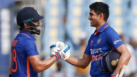 India's Virat Kohli congratulates teammate Shubman Gill on his century during the 3rd ODI match against Sri Lanka, at Greenfield International Stadium, in Thiruvananthapuram on Sunday. (ANI Photo)(ANI)