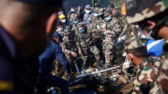 Nepal Plane Crash: Rescue teams from Nepal Army and Police work to retrieve bodies at the crash site.(Reuters)