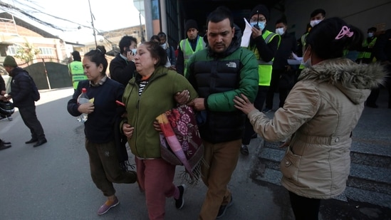 Nepal Plane Crash: Relatives of a crashed passenger plane wail at Katmandu airport, Nepal.(AP)