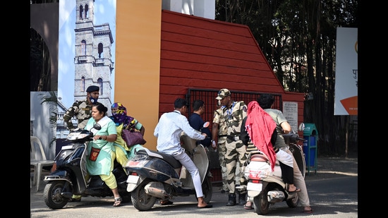 Security guards stop people from entering SPPU campus on Sunday. (Kalpesh Nukte/HT PHOTO)