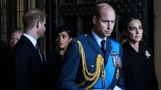 Prince Harry-Meghan Markle: Britain's Prince William, Kate, Princess of Wales, Prince Harry and Meghan, Duchess of Sussex, second left, leave after they paid their respects to Queen Elizabeth II.(AP)