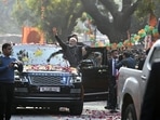 PM Modi being welcomed by people. (Sanjeev\ HT photo)