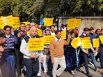 New Delhi: Delhi Chief Minister Arvind Kejriwal with Deputy Chief Minister Manish Sisodia and other AAP MLAs during a protest march towards Delhi Lieutenant Governor VK Saxena's office over his alleged interference in the working of the city government, in New Delhi. (PTI) New Delhi: Delhi Chief Minister Arvind Kejriwal with Deputy Chief Minister Manish Sisodia and other AAP MLAs during a protest march towards Delhi Lieutenant Governor VK Saxena's office over his alleged interference in the working of the city government, in New Delhi. (PTI)