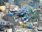 The civic body had declared the Shiv Mahal Society, on Mathuradas Road, Kandivali West, dangerous for habitation on August 25 and ordered its demolition. However, to the dismay of Devi Bhuvan Chawl residents, their nine houses were bulldozed by the developer, rendering them homeless, on December 19. (HT PHOTO) The civic body had declared the Shiv Mahal Society, on Mathuradas Road, Kandivali West, dangerous for habitation on August 25 and ordered its demolition. However, to the dismay of Devi Bhuvan Chawl residents, their nine houses were bulldozed by the developer, rendering them homeless, on December 19. (HT PHOTO)