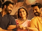 Jr NTR, Alia Bhatt and Ram Charan in a still from RRR. Jr NTR, Alia Bhatt and Ram Charan in a still from RRR.