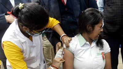 A health worker inoculates measles and rubella (MR) vaccine to a student during a state-wide MR vaccination drive, in Kolkata. (ANI)