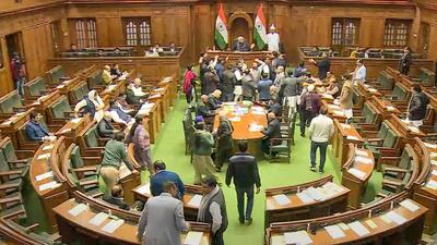 BJP and AAP lawmakers raising slogans in the assembly. (PTI) BJP and AAP lawmakers raising slogans in the assembly. (PTI)