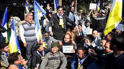 Democratic Azad Party members protesting against the land eviction order in Jammu. (ANI) Democratic Azad Party members protesting against the land eviction order in Jammu. (ANI)