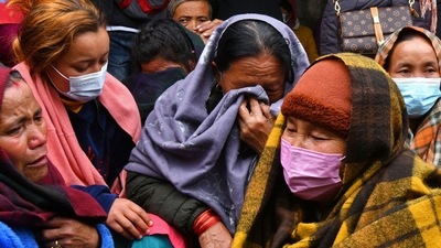 Family members and relatives of victims who died in a Yeti Airlines plane crash, weep outside a hospital in Pokhara. (AFP) Family members and relatives of victims who died in a Yeti Airlines plane crash, weep outside a hospital in Pokhara. (AFP)