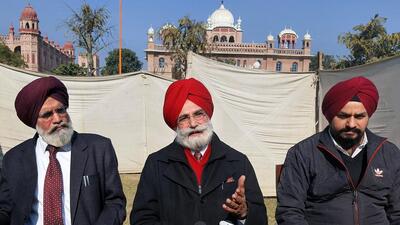 Non-Government Aided Colleges Management Federation president Rajinder Mohan Singh Chhina addressing a press conference on Monday. (HT Photo)