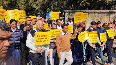 New Delhi: Delhi Chief Minister Arvind Kejriwal with Deputy Chief Minister Manish Sisodia and other AAP MLAs during a protest march towards Delhi Lieutenant Governor VK Saxena's office over his alleged interference in the working of the city government, in New Delhi. (PTI) New Delhi: Delhi Chief Minister Arvind Kejriwal with Deputy Chief Minister Manish Sisodia and other AAP MLAs during a protest march towards Delhi Lieutenant Governor VK Saxena's office over his alleged interference in the working of the city government, in New Delhi. (PTI)
